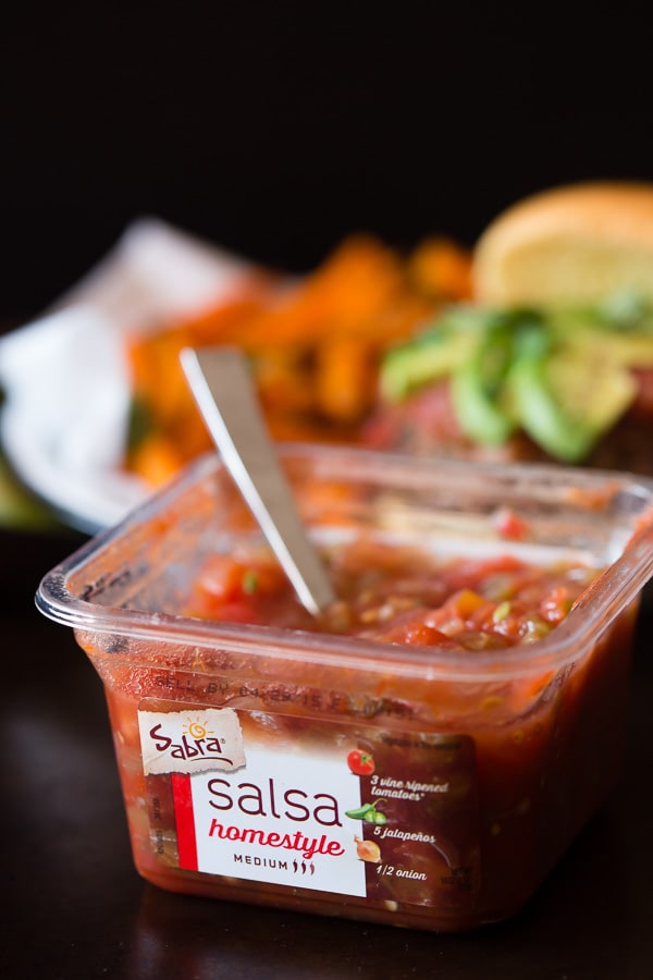 This cheesy salsa burger is perfect for your Cinco de Mayo celebration. This baby is packed full of flavor and lots of Sabra salsa. This is one packed burger!