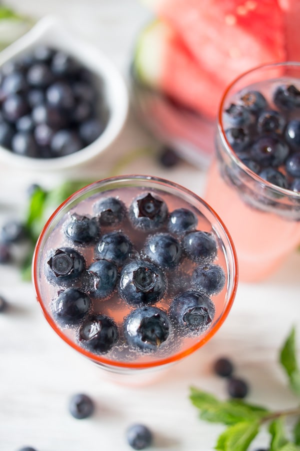 This watermelon blueberry mint spritzer is the perfect Memorial Day cocktail. Fruity watermelon mixed with fresh mint, blueberries and a touch of Truvia.
