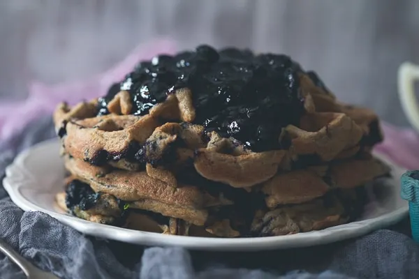 These blueberry zucchini oat waffles are the perfect way to use up those summer vegetables and fruit. Plus you can make oat flour right in your Vitamix!
