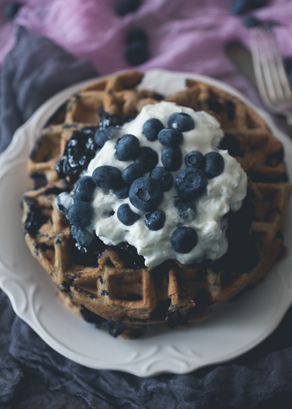 These blueberry zucchini oat waffles are the perfect way to use up those summer vegetables and fruit. Plus you can make oat flour right in your Vitamix!