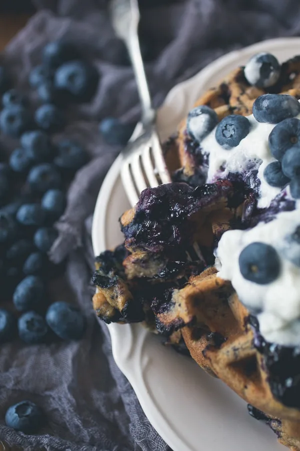 These blueberry zucchini oat waffles are the perfect way to use up those summer vegetables and fruit. Plus you can make oat flour right in your Vitamix!
