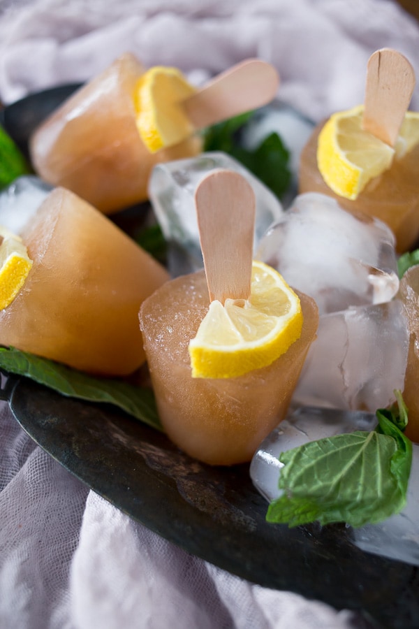 These sweet tea popsicles are the perfect way to enjoy summer. We froze up Southern sweet tea flavored with lemon and mint to create the perfect dessert.