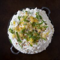 This preserved lemon and mint whipped feta dip is so easy to make you'll be making is all summer long. Ready in just 10 minutes and can be scooped up with crackers, vegetables or by the spoonful!