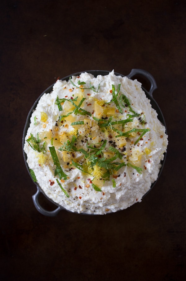 This preserved lemon and mint whipped feta dip is so easy to make you'll be making is all summer long. Ready in just 10 minutes and can be scooped up with crackers, vegetables or by the spoonful! 