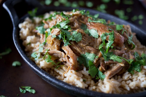 Slow Cooker Honey Mustard Pulled Pork topped with cilantro. 