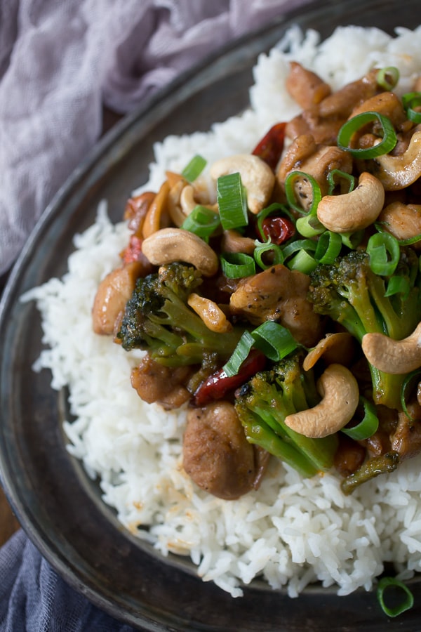 This spicy cashew chicken is better than take out. Made with delicious fresh ingredients and ready in just 30 minutes. It's fake out take out and it's delicious!