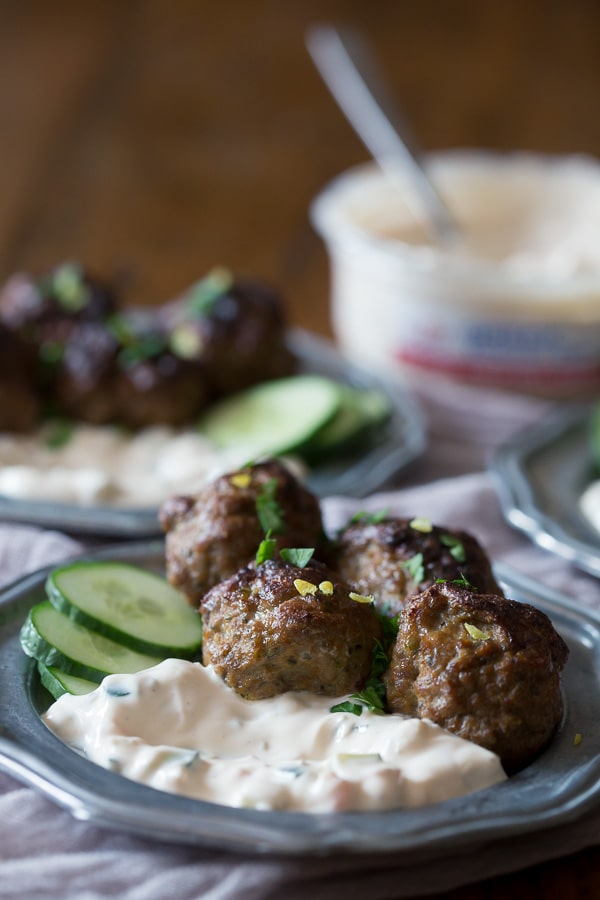 These spicy meatballs with yogurt dipping sauce are the perfect appetizer or main course. Slightly spicy and perfectly cooled down when dipped. You'll love this combo!