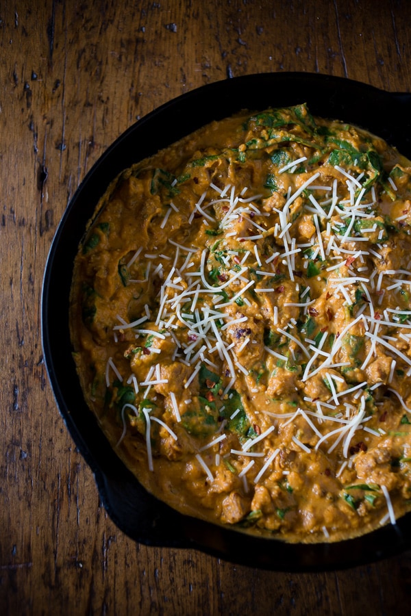 This spicy sausage pumpkin pasta sauce is packed full of delicious pumpkin and is perfect served over pasta, ravioli or gnocchi. Super simple to make and packed full of fall flavor.