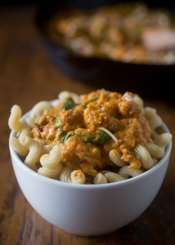 This spicy sausage pumpkin pasta sauce is packed full of delicious pumpkin and is perfect served over pasta, ravioli or gnocchi. Super simple to make and packed full of fall flavor.