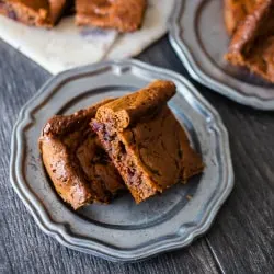 These paleo gingerbread blondies are packed full of holiday flavor. 100% Paleo made with almond butter, honey, warm spices and black currant jam.