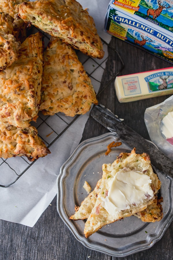 These parmesan prosciutto scones are packed full shredded parmesan, prosciutto, chives and lots of delicious butter. They are perfect for Christmas morning!