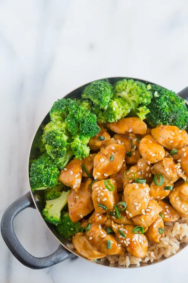 This 20 minute healthier orange chicken is the perfect weeknight dish. Why pay for take out when you can make this quick and easy dish from scratch. Trust me, you'll LOVE this dish it's seriously that EASY!