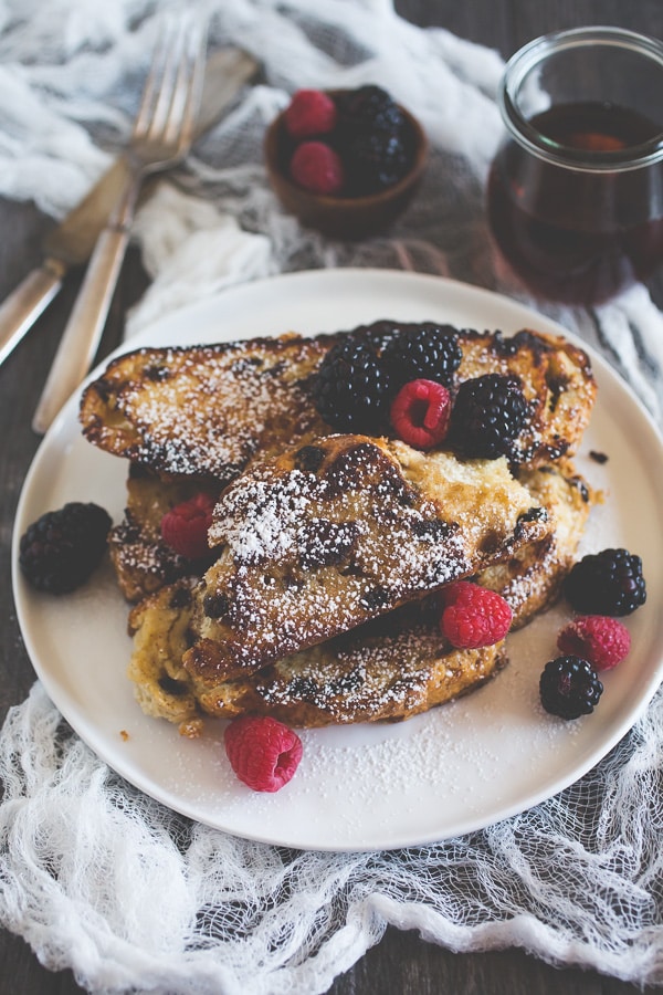 This Irish soda bread French toast is toasted until browned and topped with powdered sugar and fresh berries. Say hello to breakfast! You're gonna love it!