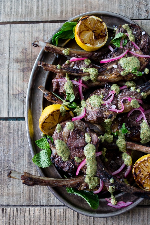 These grilled lamb chops with pistachio mint pesto are a fun way to jazz up your Easter dinner. The whole dish is ready in just 20 minutes and is packed full of springtime flavor. Lightly seasoned lamb drizzled with a homemade pesto that is sure to impress even your pickiest of eaters.