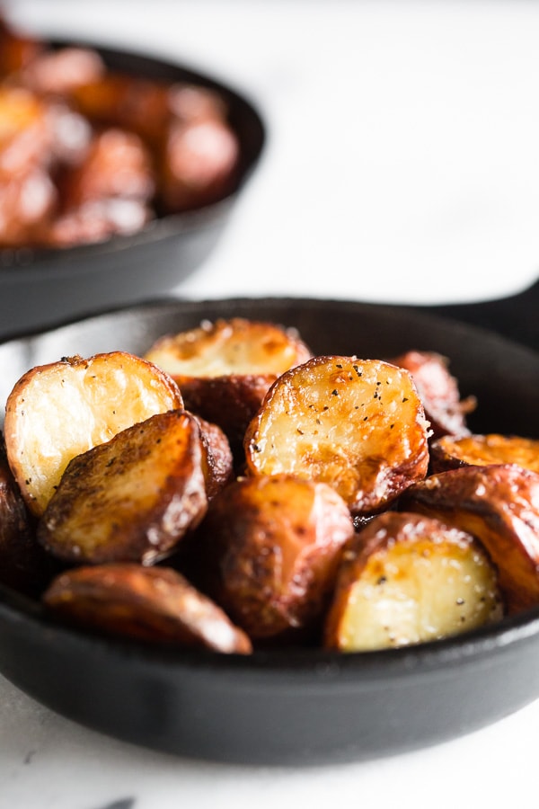 These perfect roast potatoes come out of the oven perfectly seasoned and perfectly crispy. I know that's a lot of perfect for one sentence but these potatoes live up to their name! 