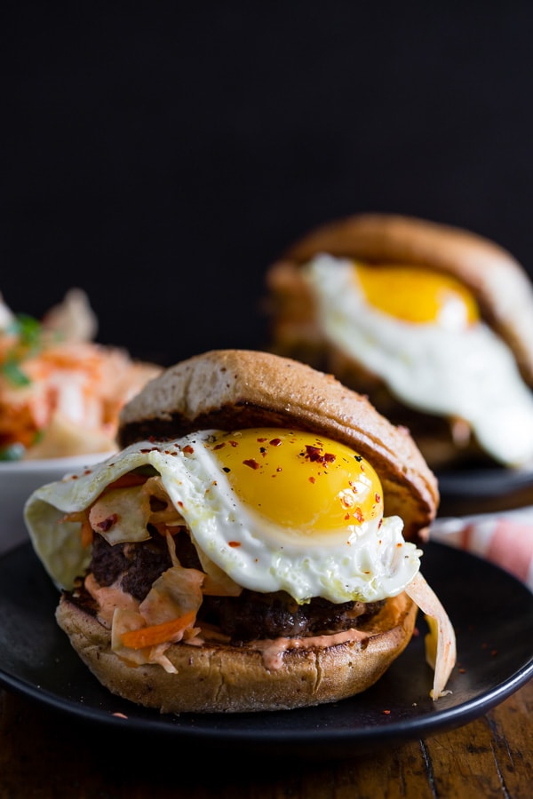 This kimchi burger is topped with a fried egg and TONS of kimchi. You'll love all the flavor that is PACKED into these burgers! Say goodbye to boring burgers.
