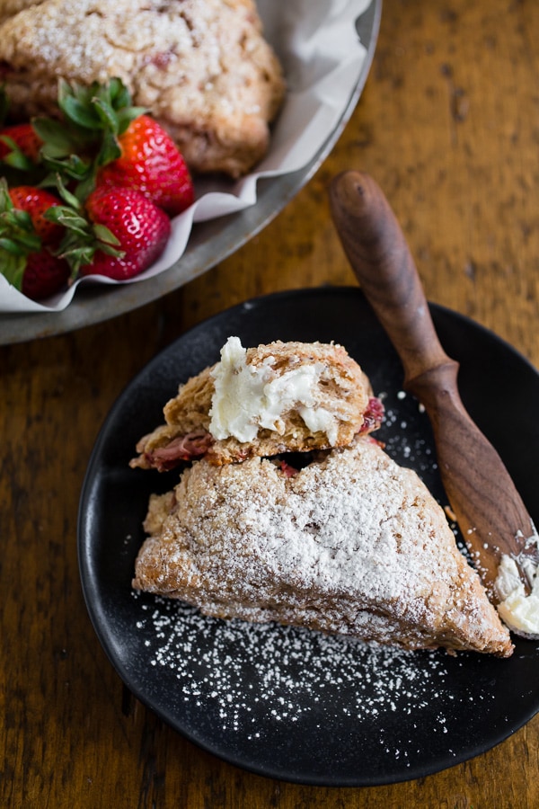 These roasted strawberry Greek yogurt scones are packed full of fresh roasted berries, vanilla Greek yogurt and made with white whole wheat flour! So easy to make and perfect for a lazy Sunday breakfast treat.