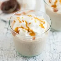 This boozy caramel apple butter milkshake is the perfect adult dessert to enjoy all year round. Full of vanilla bean ice cream, apple butter, spiced rum and just a touch of delicious caramel. You'll love this sweet treat!