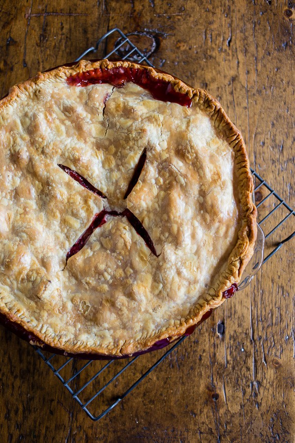 This homemade strawberry rhubarb pie is the quintessential summer pie. Filled with sun-ripened strawberries and tart rhubarb. Serve warm, room temperature or with a big giant scoop of ice cream. 
