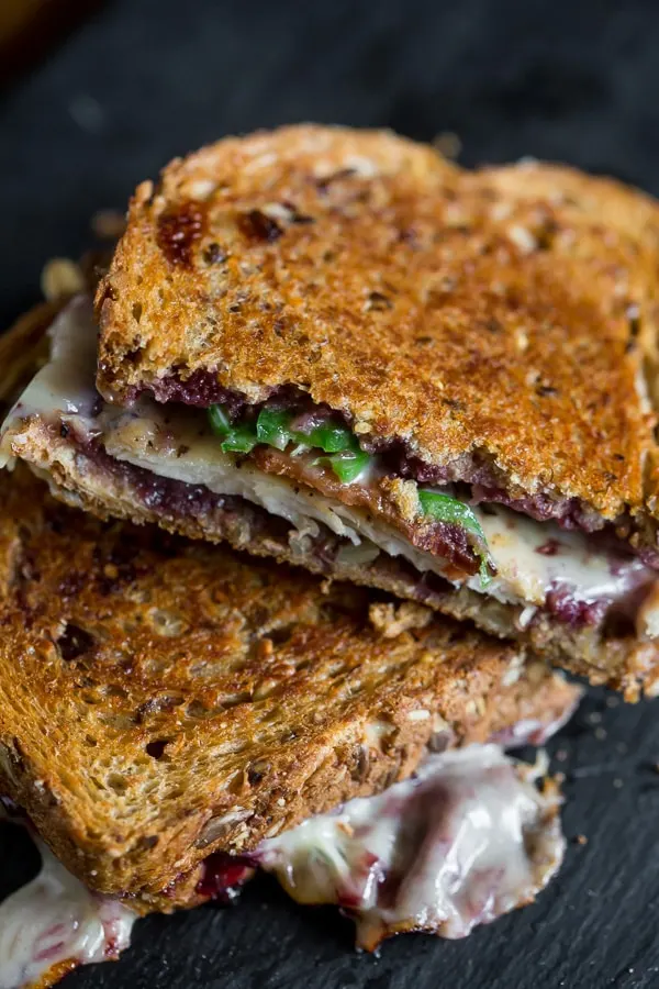 This mixed berry chicken bacon jalapeno grilled cheese is the perfect way to spice up your sandwich routine. It’s sweet and savory with just a hint of heat. Trust me, you’ll love this delicious melty sandwich.
