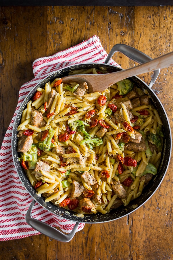 The one pot cheddar cajun pork pasta is packed full of broccoli, slow roasted cherry tomatoes, sharp cheddar cheese and LOTS of cajun spiced pork. You'll love how simple this dish is to make and the cleanup is a breeze since it's all made in the same pot! 