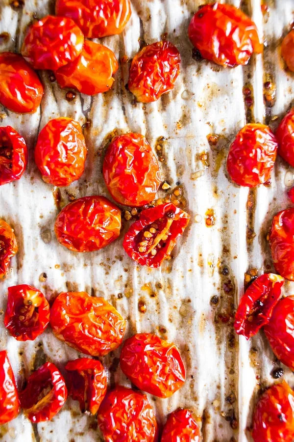 These slow roasted cherry tomatoes are made in the oven and come out sweet and delicious. Ready in 3 hours and perfect for pasta, salad, sandwiches or even for mid-day snacking. 