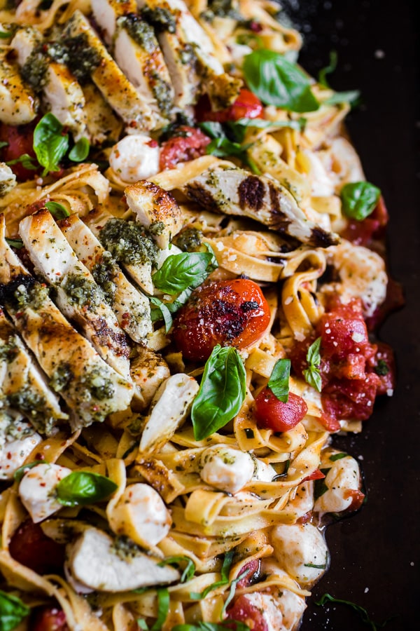 Pesto Chicken Caprese Pasta on a large platter. 