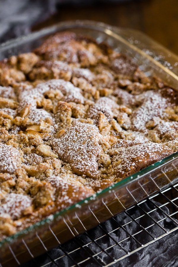 This spiced apple pie coffee cake is the perfect addition to your fall dessert menu. Fresh apples baked into a spice cake and topped with a buttery crumble topping. You'll love how easy this dessert is to make and your whole family will be begging for a slice. 