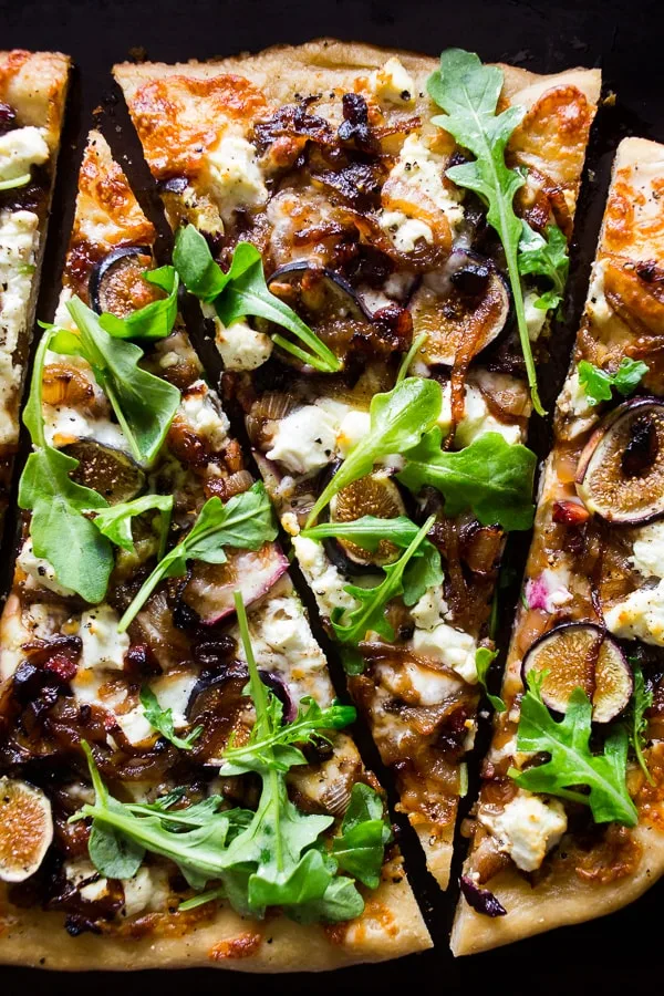 This fig caramelized onion pizza is full of flavor and ready in no time. You'll love this flavor packed pizza and be craving it all. fall. long. Trust me, this pizza needs to be made ASAP!