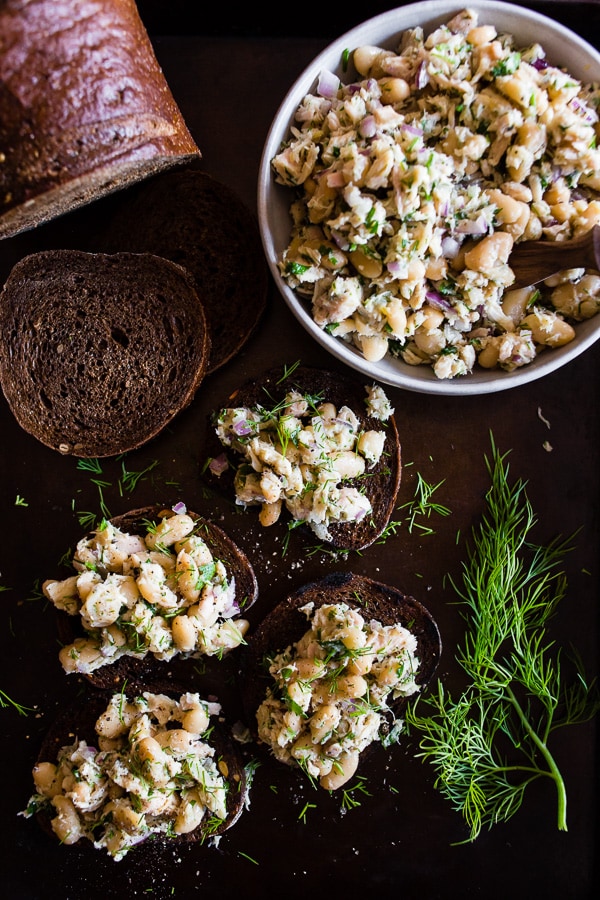 This tuna white bean herb salad is packed full of fresh lemon, herbs and cannellini beans. It's perfect served on toasted bread or while eating straight from the bowl. You'll love how light and easy this tuna salad is to make!