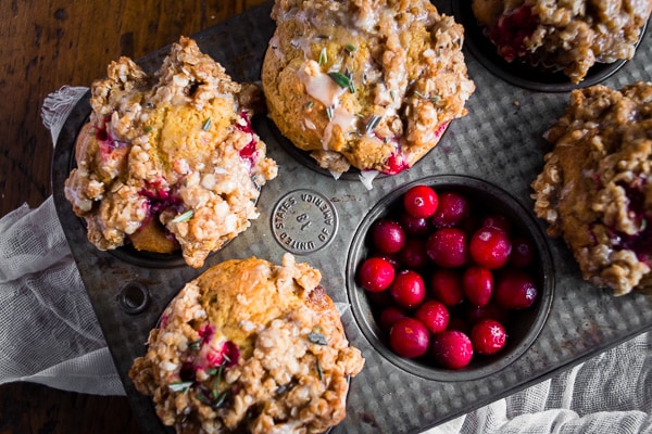 Cranberry Orange Rosemary Muffins in a muffin tin. 