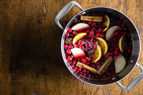 This holiday spiced mulled wine is just what your holiday party needs! Full of red wine, apple cider, whole spices and lots of fresh fruit. You'll love how cozy you'll feel sipping on a mug of this deliciousness. 