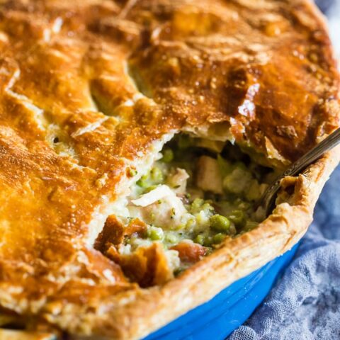 This puff pastry turkey pot pie is the perfect way to use up all those turkey holiday leftovers. Packed full of delicious vegetables, homemade gravy and topped with buttery flakey puff pastry topping. Plus it's hot and ready on your table in around 90 minutes!
