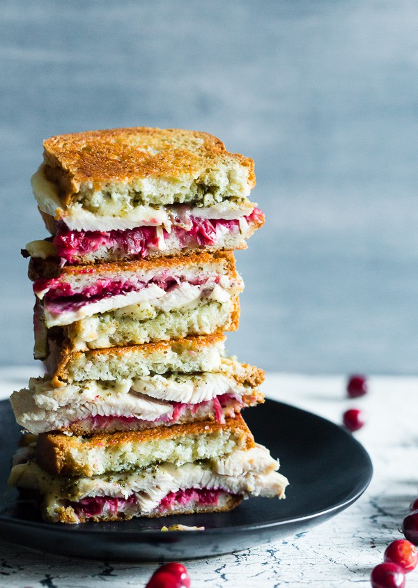 This turkey cranberry pesto panini is the perfect use for all your leftover Thanksgiving turkey and cranberry sauce. Totally delicious and ready in just 15 minutes. You'll love this melty flavor packed panini! 