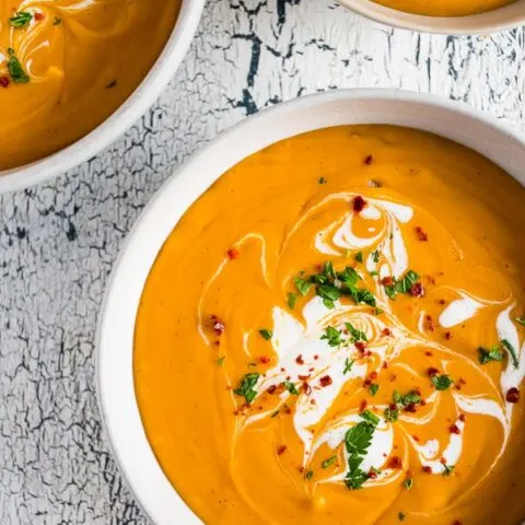 This creamy red lentil carrot soup is ready in just 30 minutes and is the perfect easy holiday and weeknight rush dinner. Keep it vegan by skipping the Greek yogurt topping or give yourself a big dollop - the choice is totally yours!