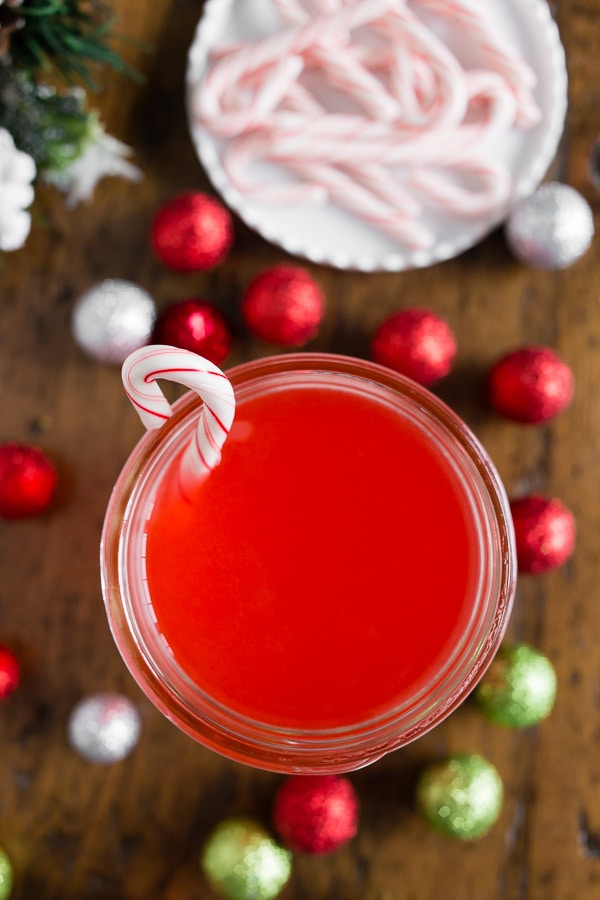 This homemade candy cane vodka is the perfect holiday nip you need! Add to mugs of hot chocolate or coffee or even a glass of your favorite eggnog. You'll love how easy it is to make your own flavored vodka plus it's ready in just 24 hours! 