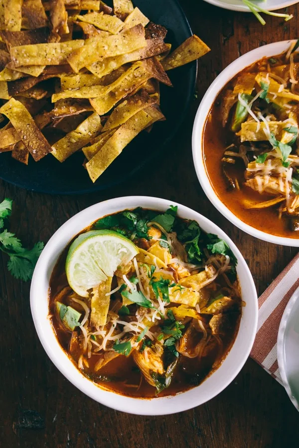 chicken and chard tortilla soup topped with homemade tortilla strips