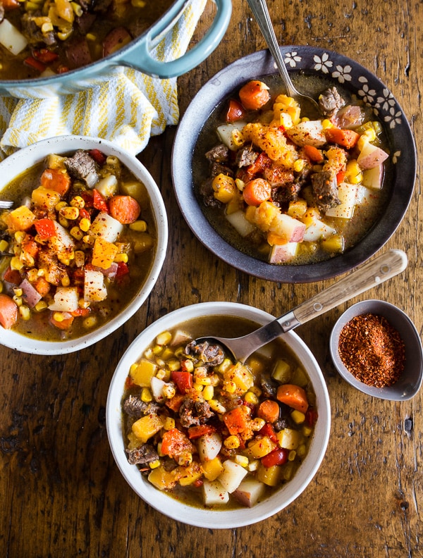 This Chilean carbonada soup is a classic dish found in Chile. It's pure comfort in the form of beef, corn, potatoes, pumpkin and carrots. It's easy to make and feels like comfort in a bowl. Plus, it's perfect for cool spring nights.