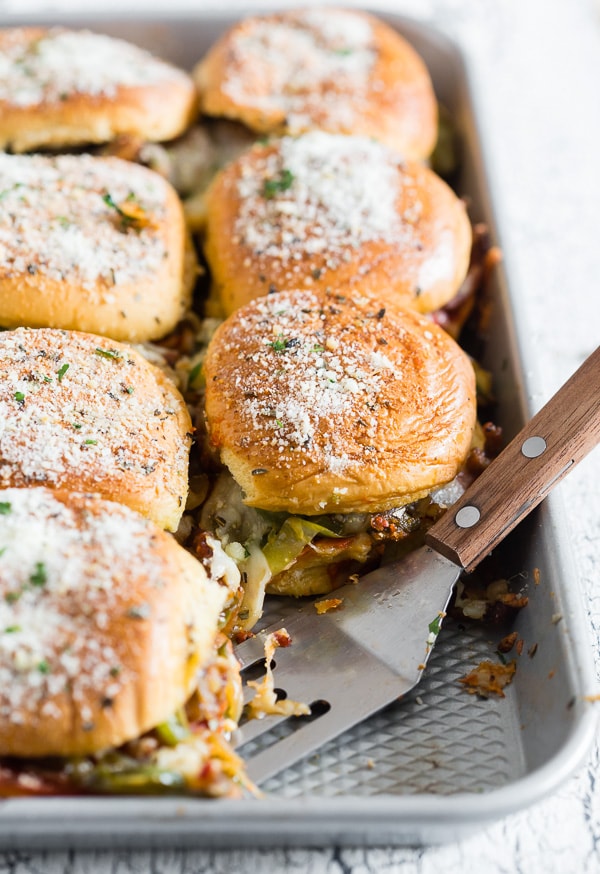 Baked Supreme Pizza Sliders served in a pan. 