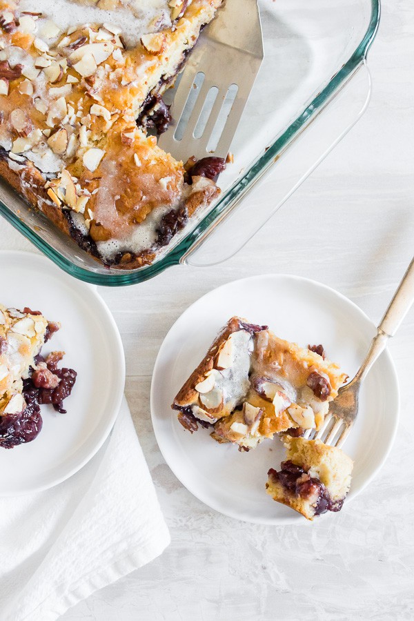 This cherry fritter cake is packed full of summer flavor. A fresh cherry filling that is sandwiched in between a moist cake and topped with a vanilla bean glaze. You’re going to go crazy for this cake!