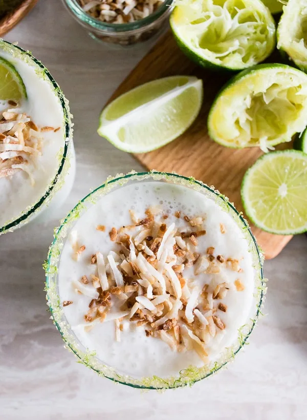 coconut lime frozen margarita served with toasted coconut. 