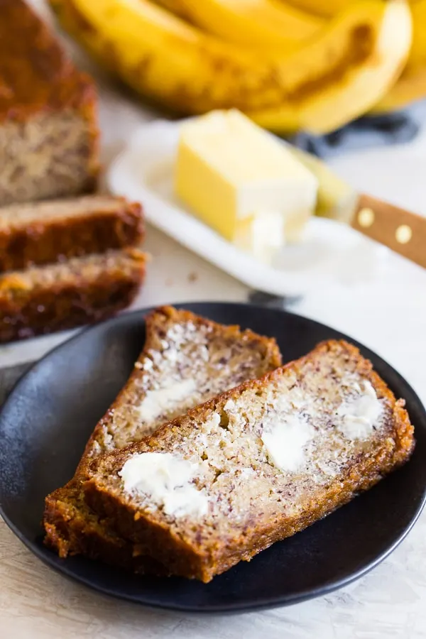 Coconut Rum Lime Glazed Banana Bread served with butter. 