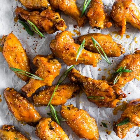 These pineapple mango habanero chicken wings are the perfect summertime appetizer or easy dinner! They're a delicious mix of sweet and spicy and can be made in your oven or the grill. It's time to give into your chicken wing cravings!