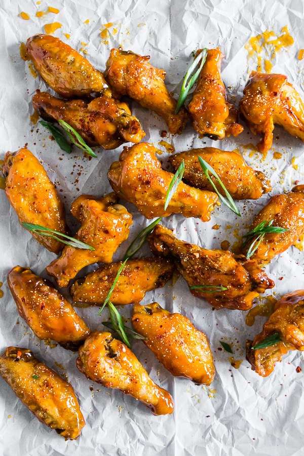 These pineapple mango habanero chicken wings are the perfect summertime appetizer or easy dinner! They're a delicious mix of sweet and spicy and can be made in your oven or the grill. It's time to give into your chicken wing cravings!