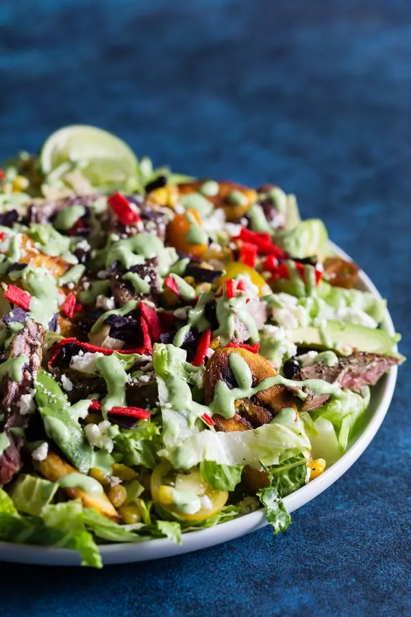 Southwest Steak Salad drizzled with cilantro dressing. 