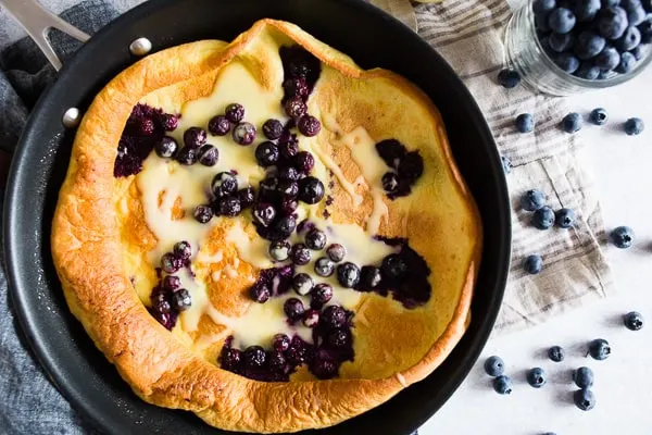 This blueberry lemon curd Dutch baby is the perfect way to start the day! Sweet and sour all in one delicious bite. You'll love this sweet breakfast treat!