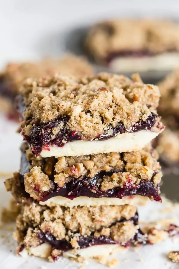 These vanilla bean plum butter crumble bars the perfect salute to the end of summer. Shortbread crust covered in homemade vanilla bean plum butter and topped with a nutty crumble topping. You'll love how sweet and fruity these bars taste.