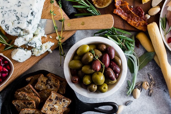 This fall harvest cheese board is the perfect combo of flavorful cheeses, Italian meats, dried fruits, fresh fruits and crispy crunchy crackers. If you have ever been intimidated about putting together a cheese board I have you covered with step by step instructions! 