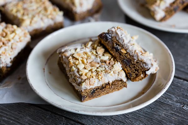 These chocolate chip maple peanut butter bars are the perfect combo of traditional cookie flavors mixed with the flavors of fall. They are super simple to make and the perfect short on time dessert. Who wouldn't love a cookie bottom topped with creamy maple frosting and sprinkled with peanuts and toffee bits.