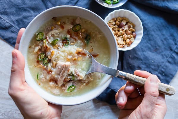 This Instant Pot Asian chicken and rice soup is super comforting and cooks in just 20 minutes. It's packed full of flavor and fun twist on traditional chicken and rice soup. You'll love this soup! 
